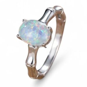 Silver Bamboo Opal Pendant Ring Size 8

Brand New